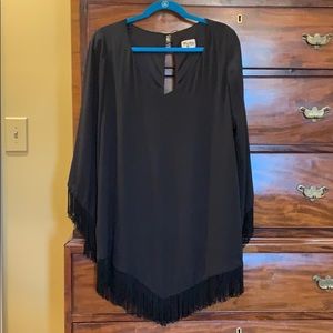 Black cocktail dress by Show Me Your Mumu.